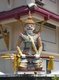 Thailand: A yaksa guardian figure on the corner of the temple wall, Wat Matchimawat, Songkhla