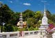 Thailand: Chedi and a pagoda in the grounds of Wat Matchimawat, Songkhla